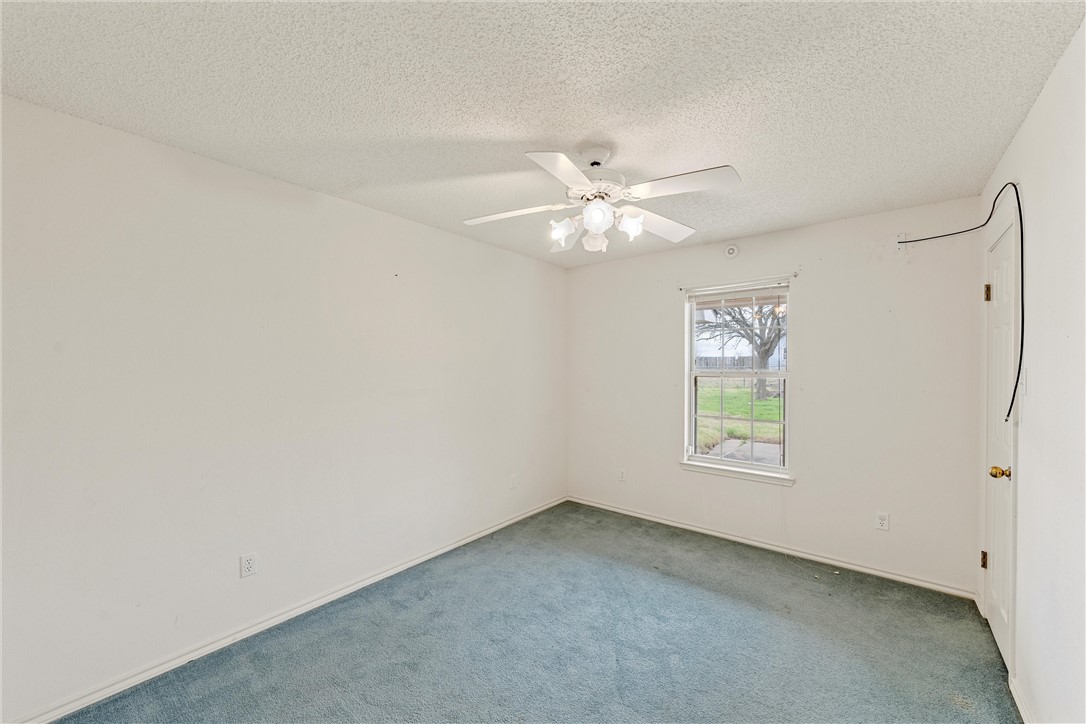 807 Birdie Lane Lorena, TX 76655 - Photo 16 of 32 an empty room with a window