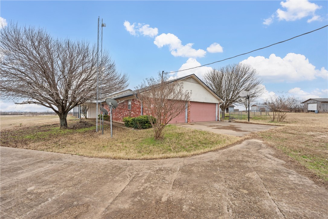 807 Birdie Lane Lorena, TX 76655 - Photo 2 of 32 a view of outdoor space yard and basketball court