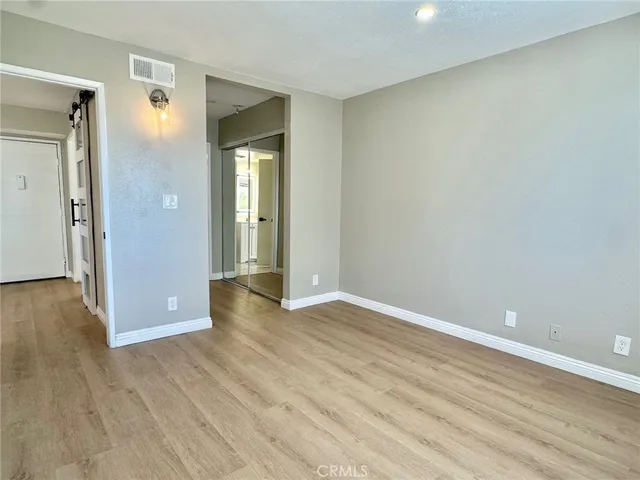 a view of a bathroom with a glass door shower
