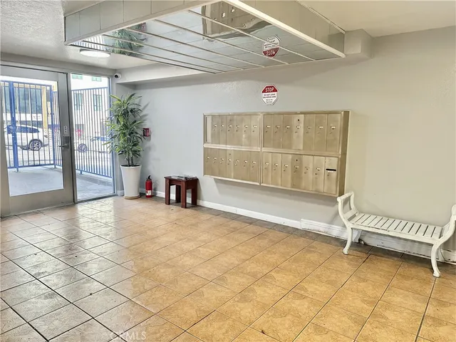 a view of a garage with cars