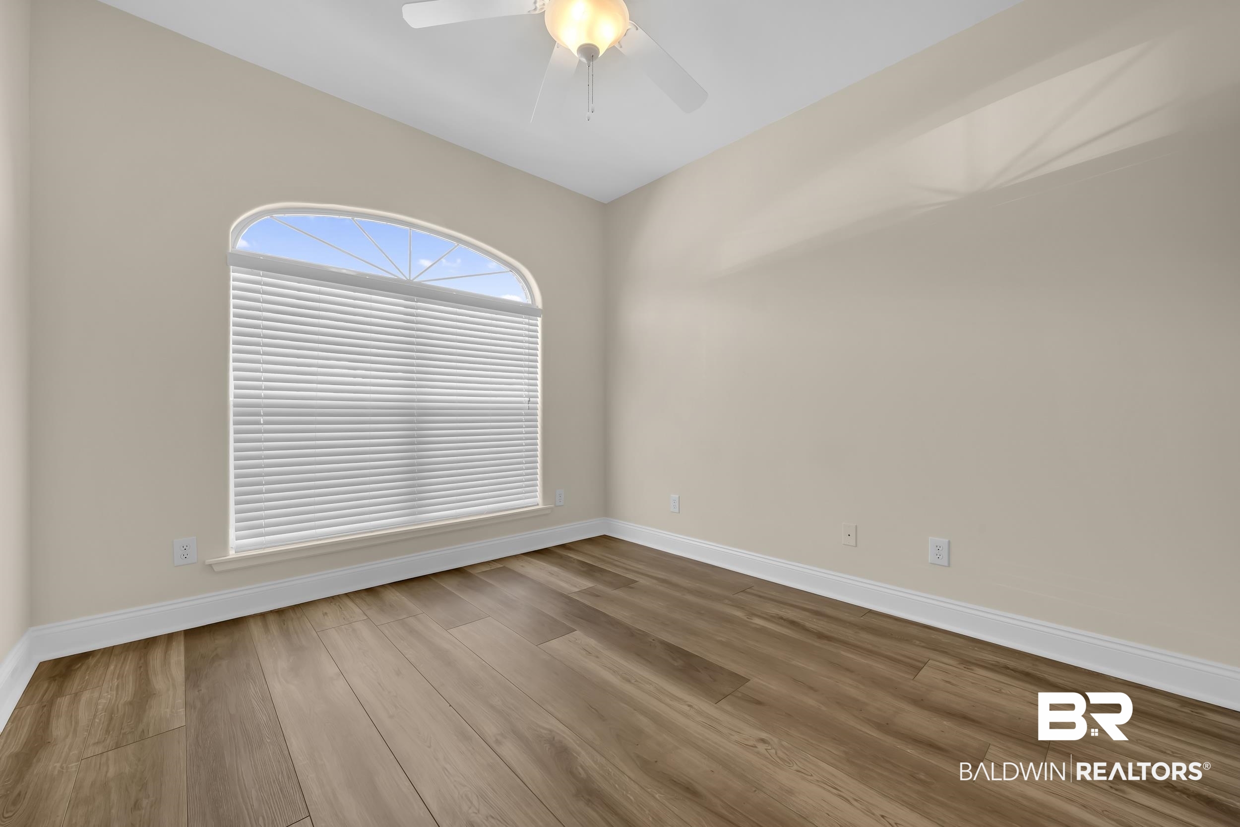 226 Hemingway Loop Foley, AL 36535 - Photo 19 of 53 Unfurnished room featuring wood finished floors and ceiling fan