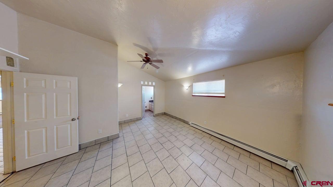 807 13th Street Alamosa, CO 81101 - Photo 19 of 31 wooden floor in an empty room