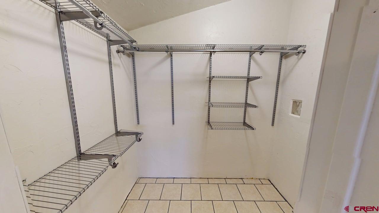 807 13th Street Alamosa, CO 81101 - Photo 20 of 31 a bathroom with a shower