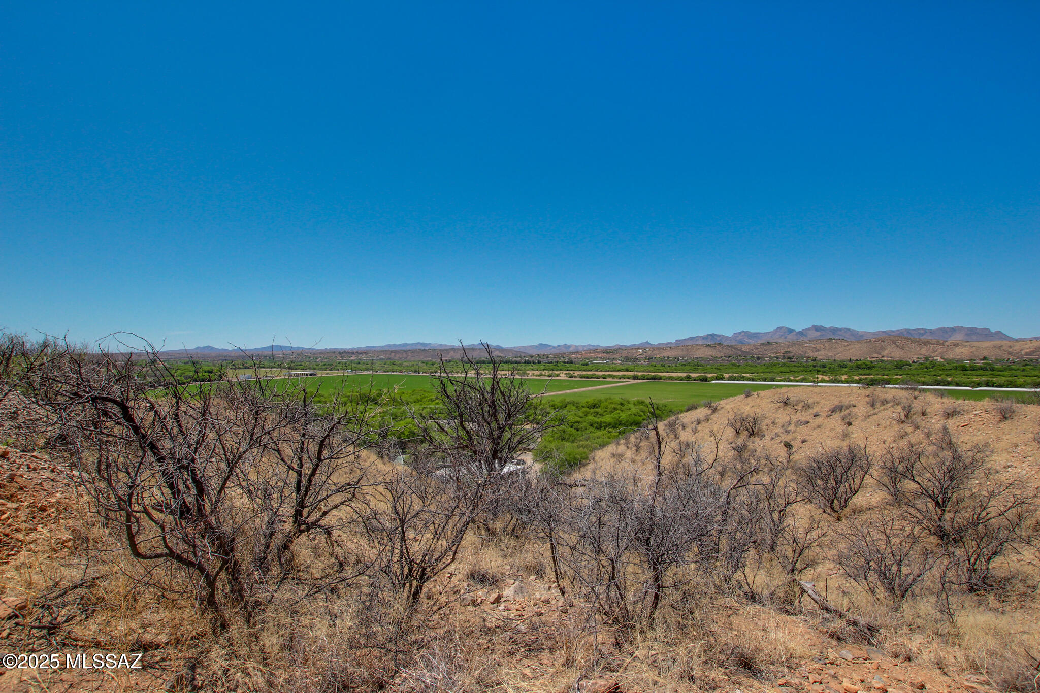 1398 Anclar Court, Unit 18 Rio Rico, AZ 85648 - Photo 4 of 30 a view of lake with green space