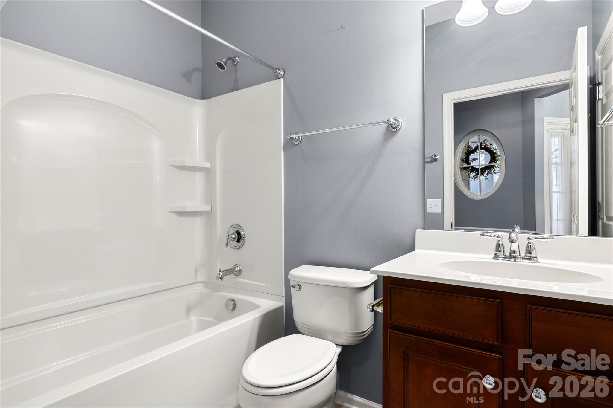 52538 Winchester Street Fort Mill, SC 29707 - Photo 19 of 48 a bathroom with a sink a toilet and shower