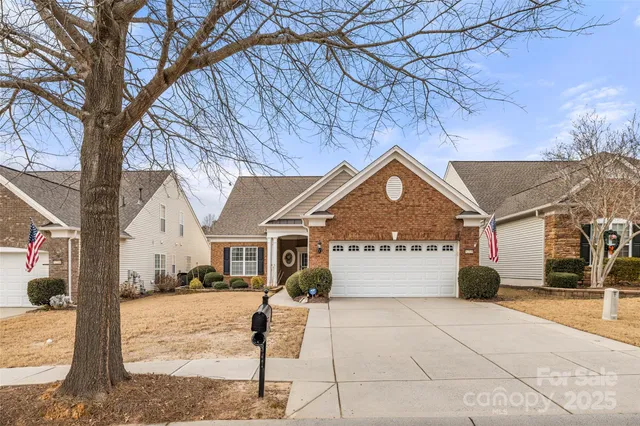 a view of pool with yard