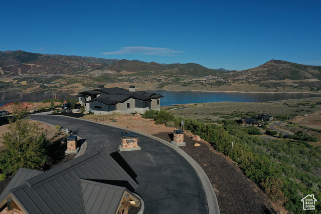 10677 North Reflection Ridge, Unit 1 Hideout, UT 84036 - Photo 5 of 41 Mountain view featuring a nearby body of water