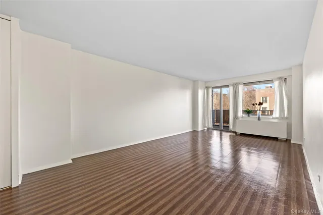 a view of a livingroom with wooden floor