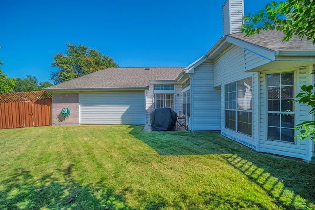 a house view with a garden space