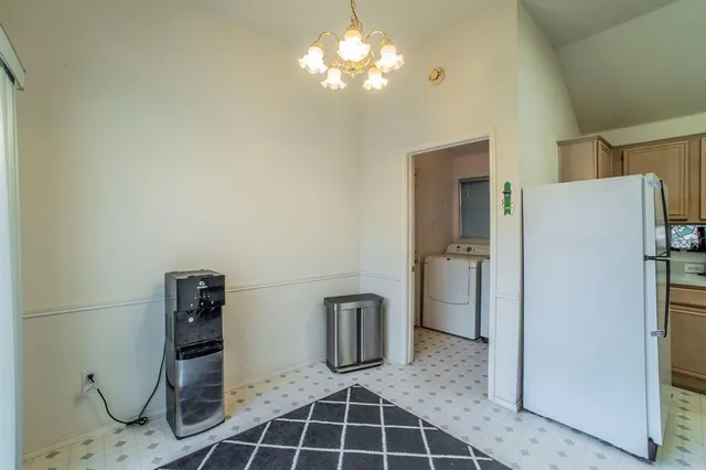 a bathroom with a double vanity sink
