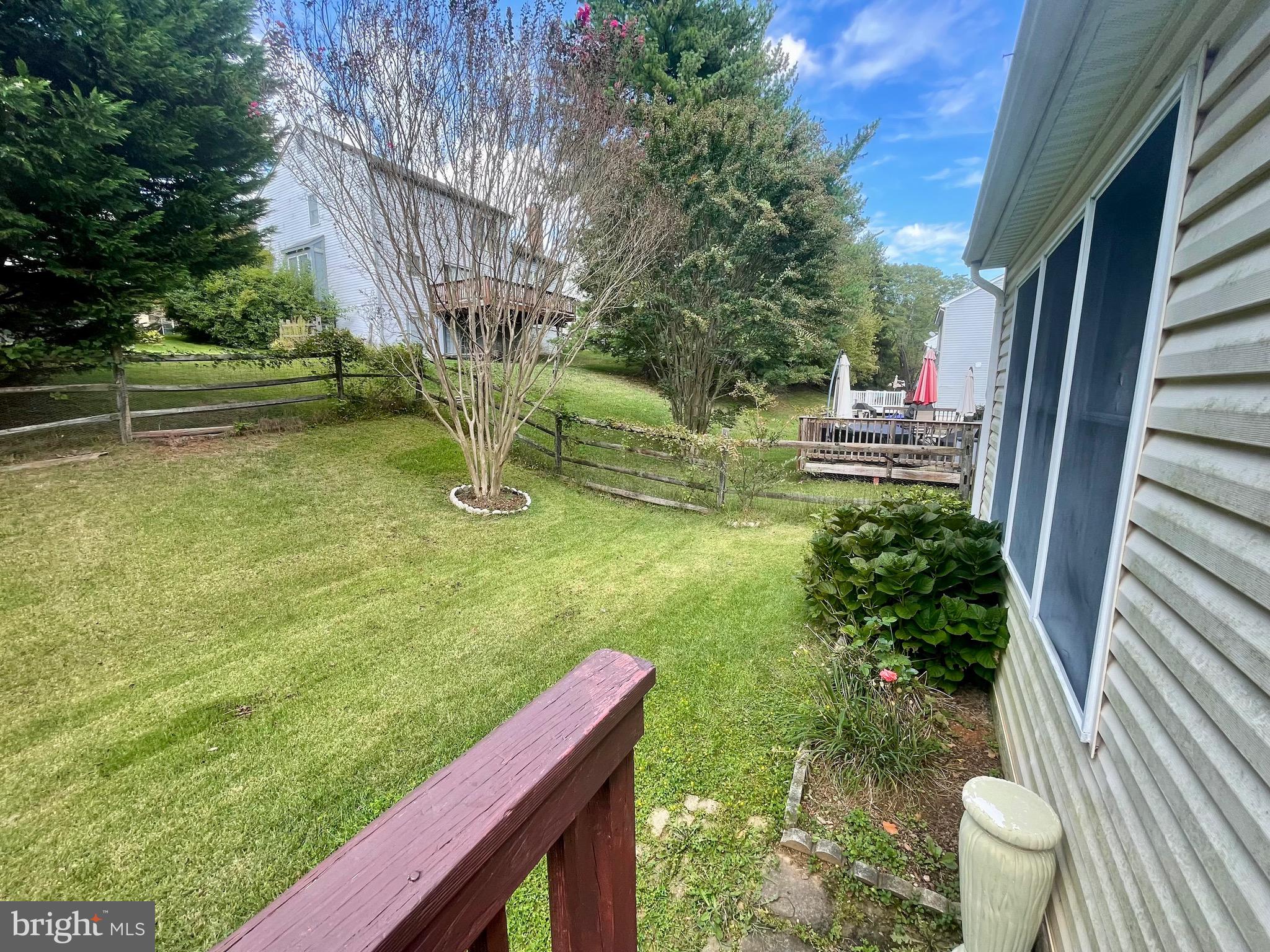 12125 Stoney Bottom Road Germantown, MD 20874 - Photo 21 of 23 a view of yard from deck having patio