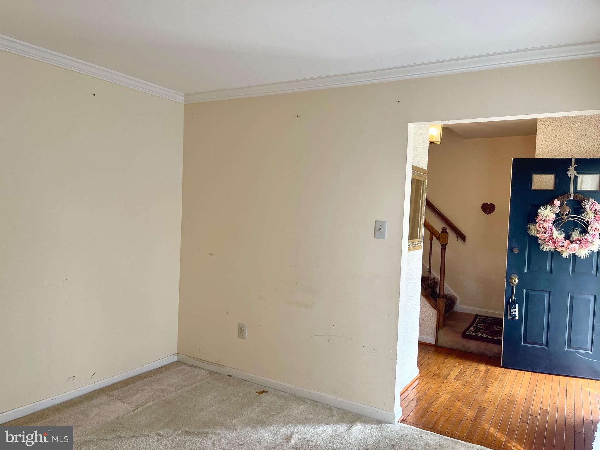 12125 Stoney Bottom Road Germantown, MD 20874 - Photo 5 of 23 a view of room with furniture and wooden floor