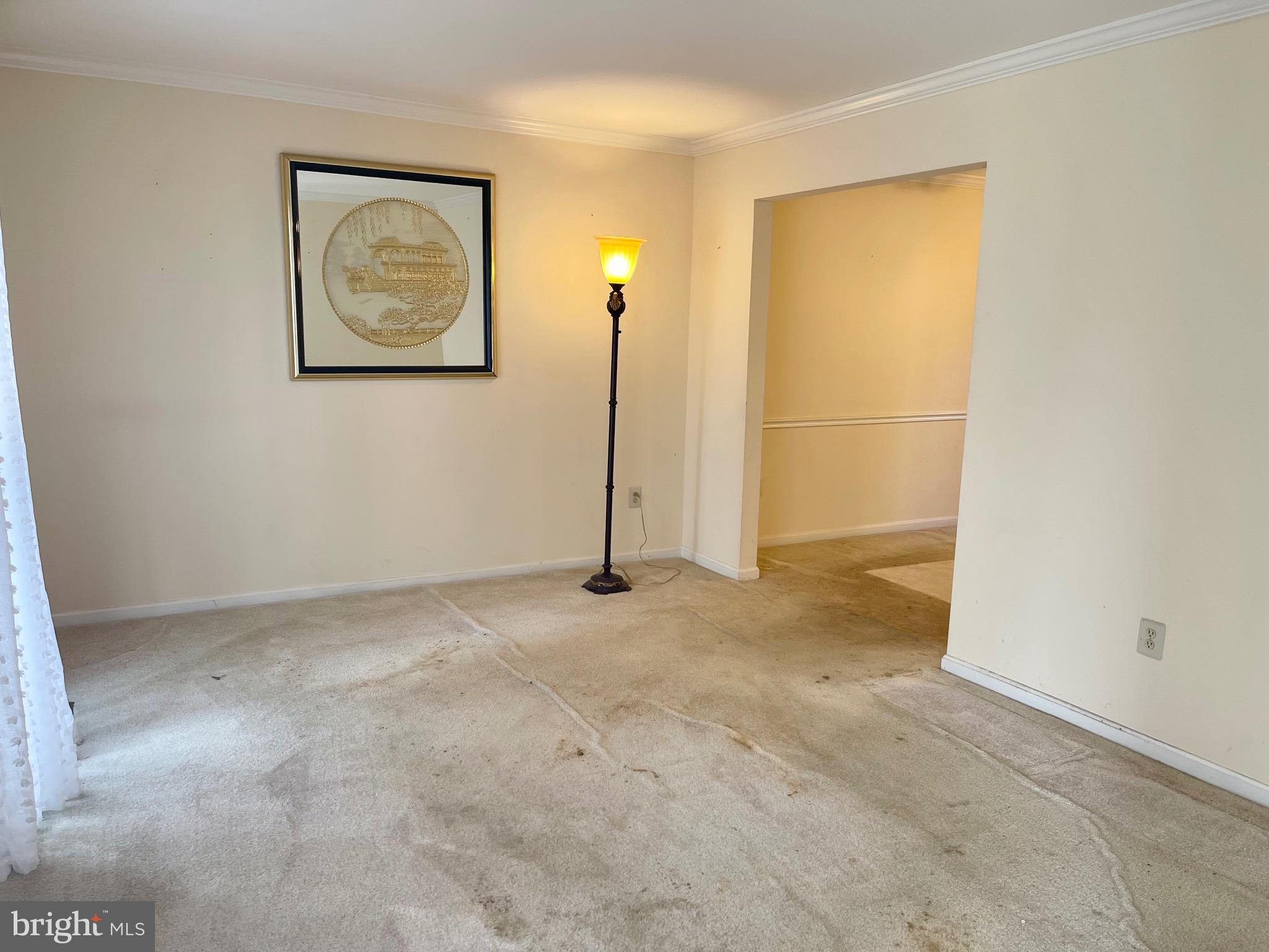 12125 Stoney Bottom Road Germantown, MD 20874 - Photo 6 of 23 a view of a room with wooden floor and wall painting