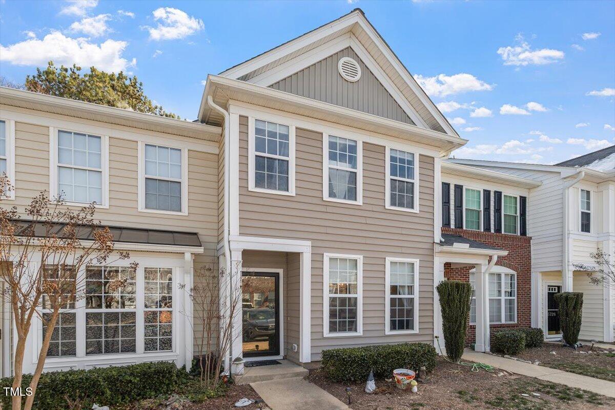 5730 Clearbay Lane Raleigh, NC 27612 - Photo 2 of 32 a front view of a house with a yard