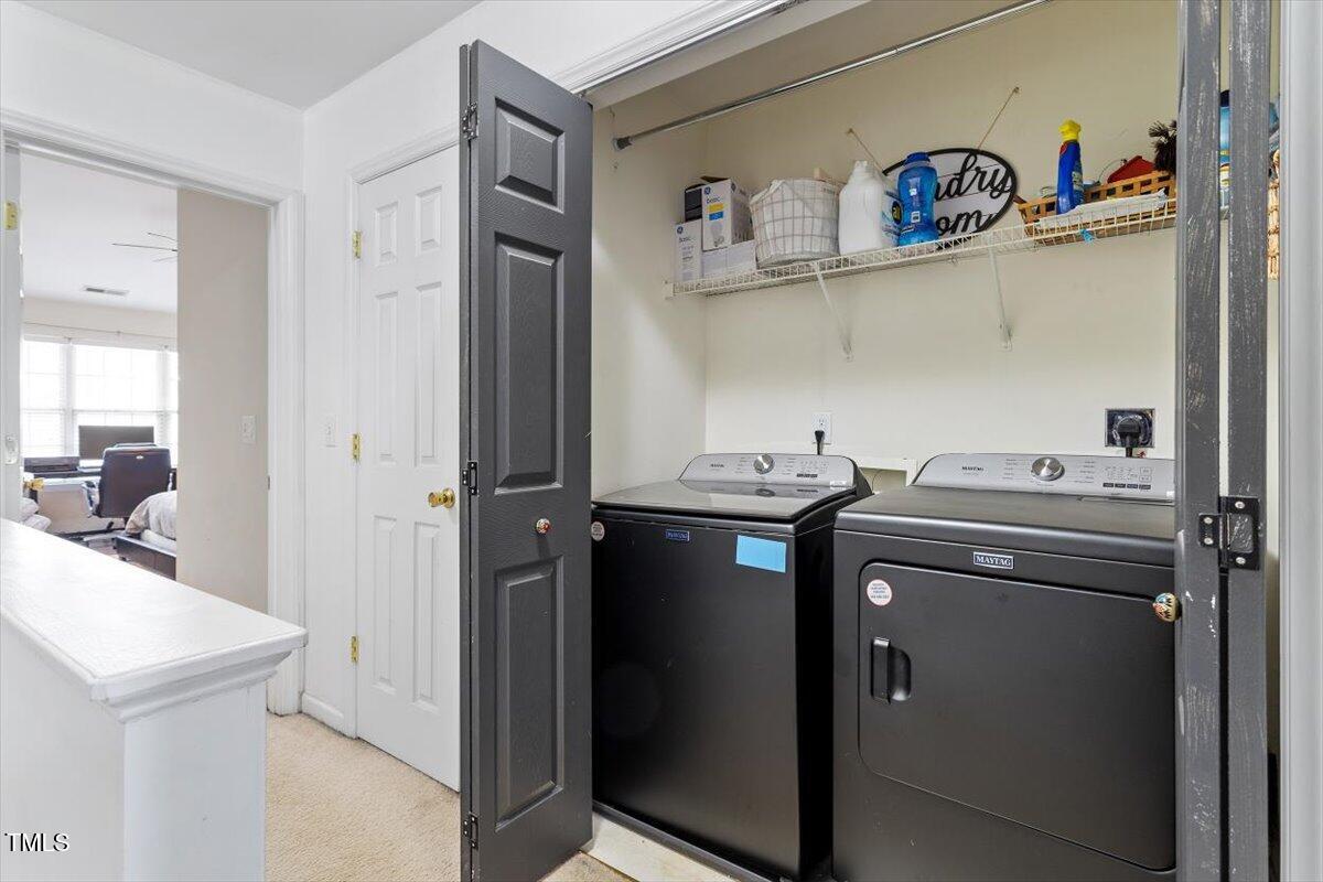 5730 Clearbay Lane Raleigh, NC 27612 - Photo 30 of 32 a utility room with dryer and washer