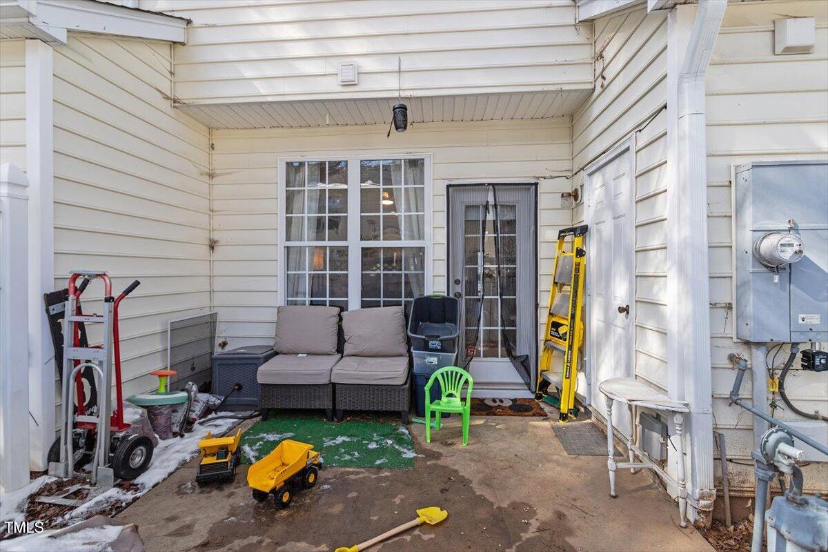 5730 Clearbay Lane Raleigh, NC 27612 - Photo 32 of 32 a view of a children toys back of the house