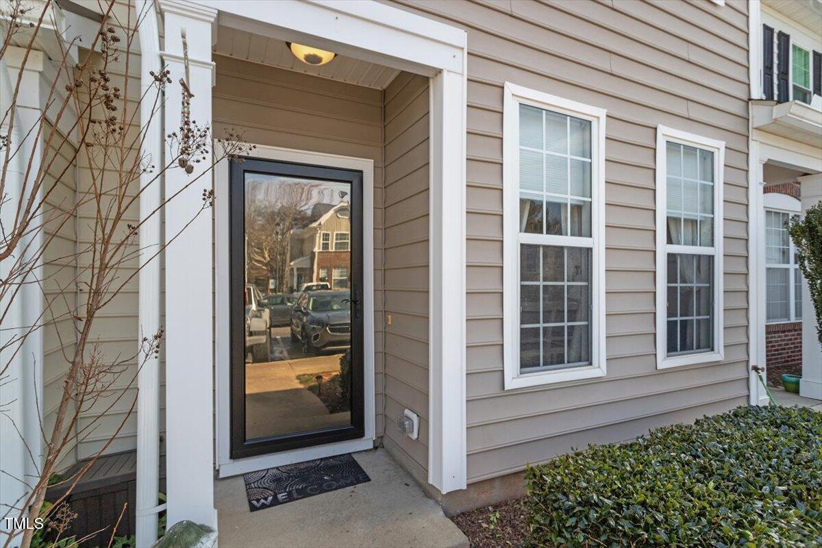 5730 Clearbay Lane Raleigh, NC 27612 - Photo 4 of 32 a view of a door of a house
