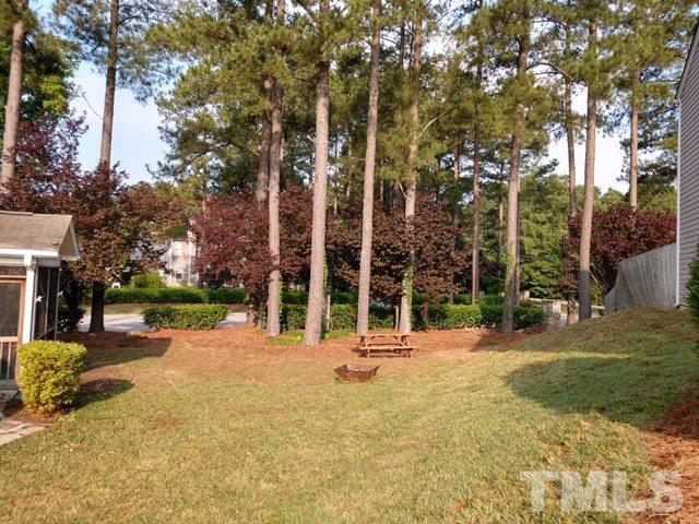 3101 Marcony Way Raleigh, NC 27610 - Photo 3 of 16 a view of outdoor space with playground and tree