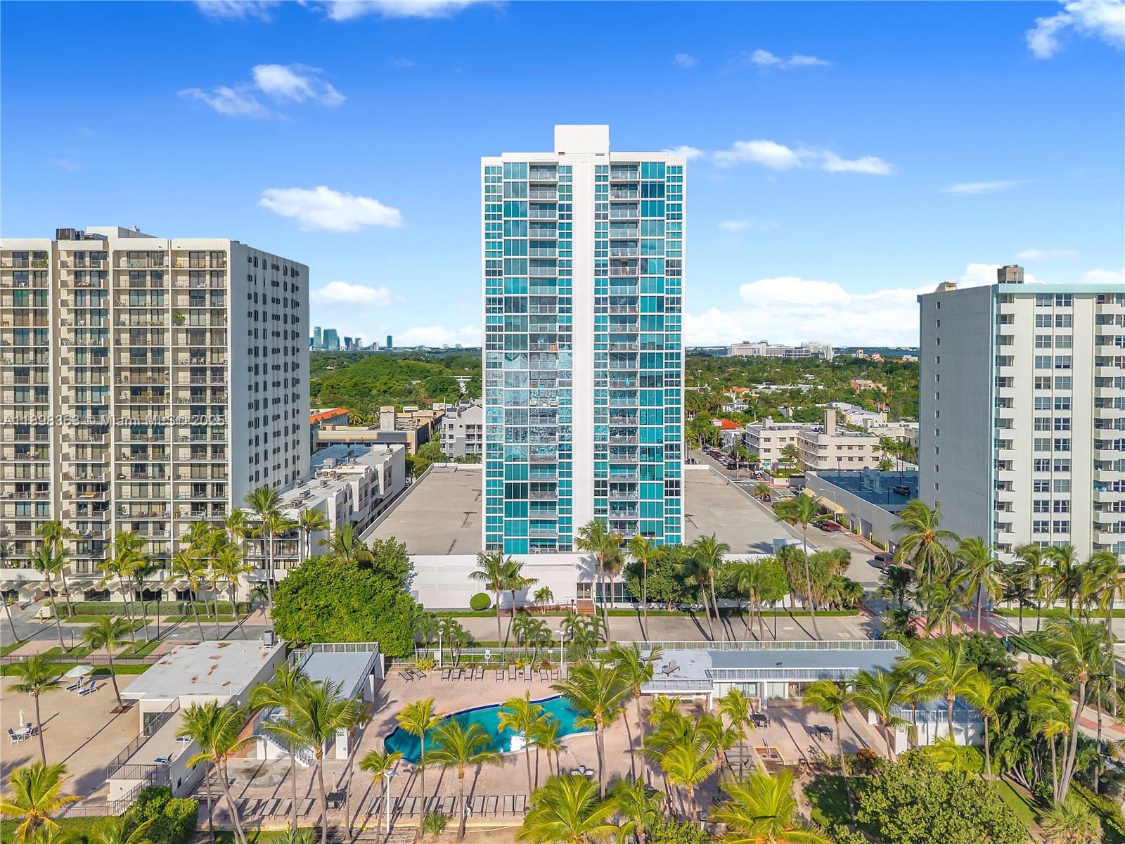 2655 Collins Avenue, Unit 1502 Miami Beach, FL 33140 - Photo 2 of 11 a view of city with tall buildings