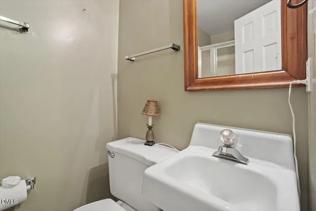 a bathroom with a sink and a toilet