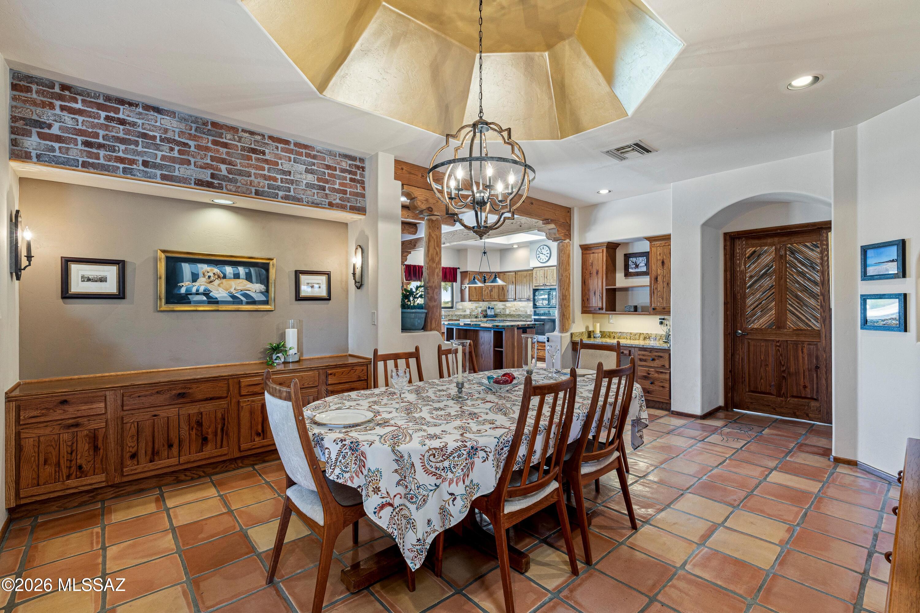 11160 East Golf Links Road Tucson, AZ 85730 - Photo 13 of 51 Built in buffet bar and beautiful accent ceiling above the dining table.