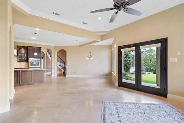 a kitchen with stainless steel appliances granite countertop a stove and a refrigerator