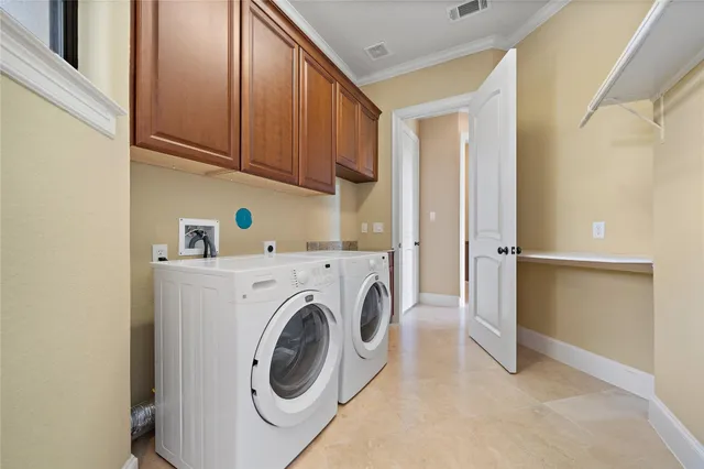 a workspace with furniture wooden floor and a chandelier