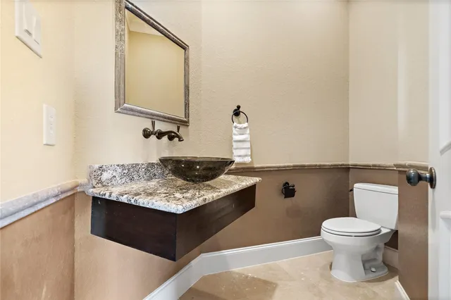 a living room with furniture a window and a table