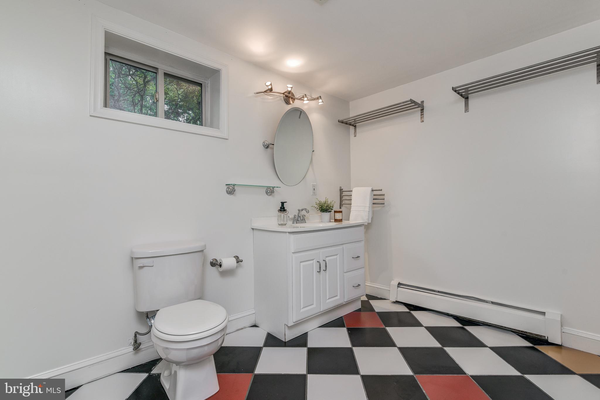 10106 Greenock Road Silver Spring, MD 20901 - Photo 29 of 34 Lower level bath with ceramic tile floor
