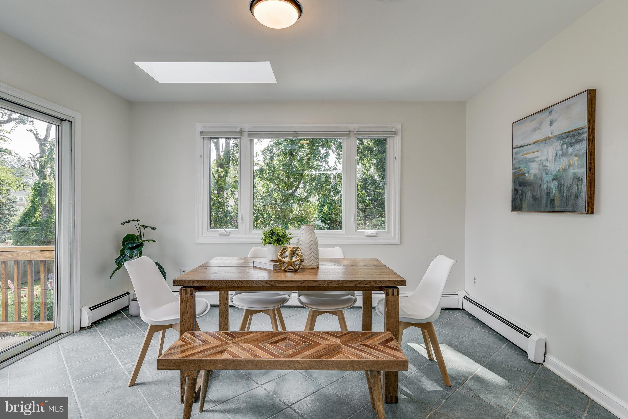 10106 Greenock Road Silver Spring, MD 20901 - Photo 9 of 34 Large table space with picture window & skylights