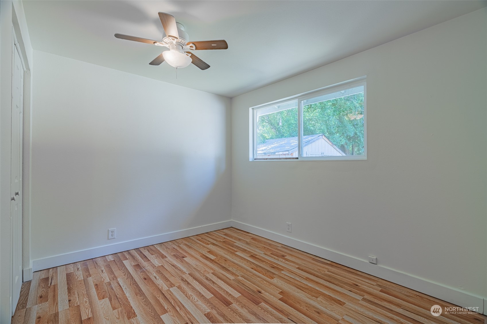 2426 Southwest 328th Street Federal Way, WA 98023 - Photo 30 of 39 an empty room with a window and a fan