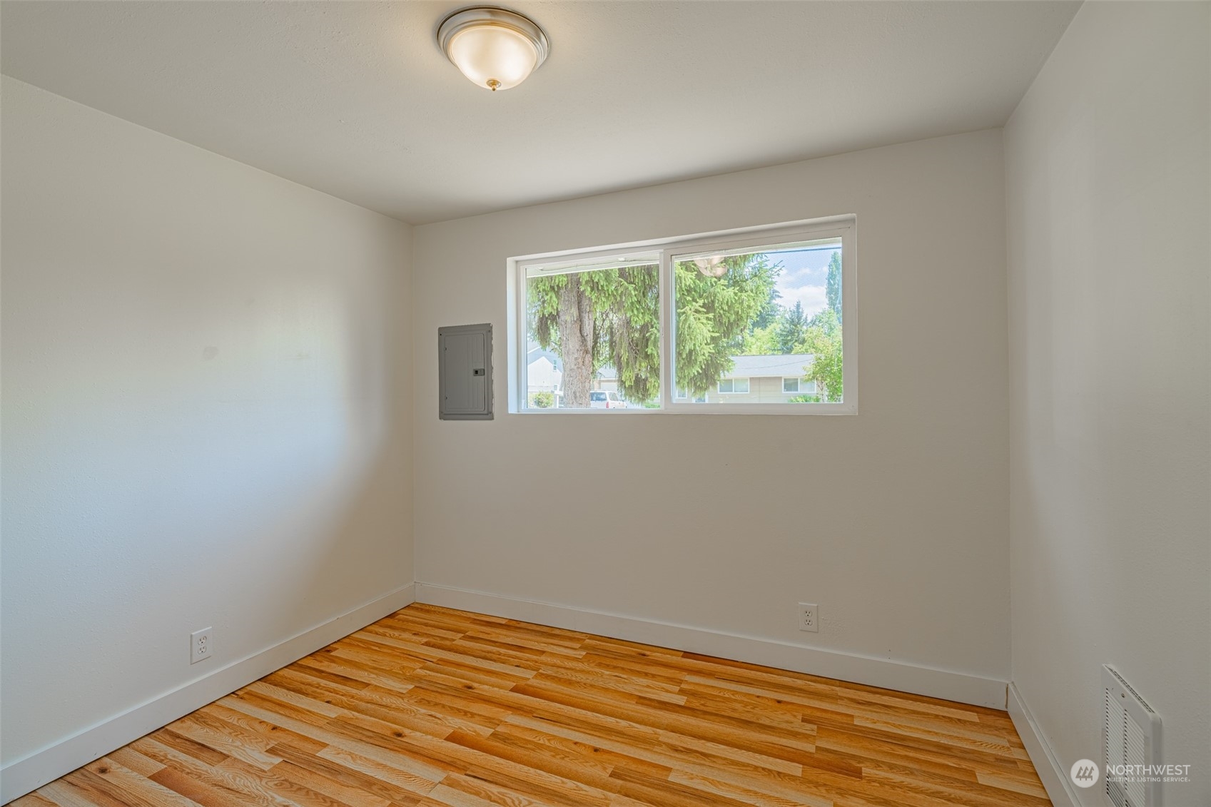 2426 Southwest 328th Street Federal Way, WA 98023 - Photo 33 of 39 a view of a room with wooden floor and fan