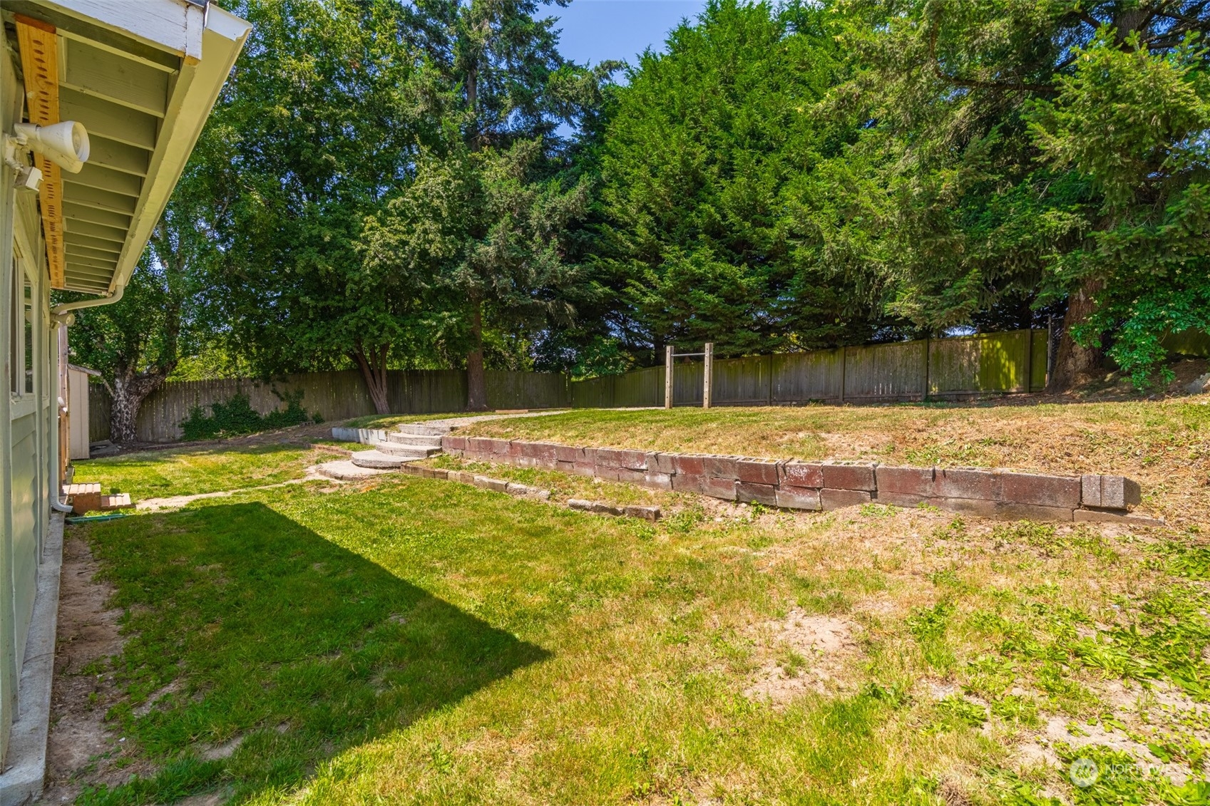 2426 Southwest 328th Street Federal Way, WA 98023 - Photo 5 of 39 a swimming pool with an outdoor space