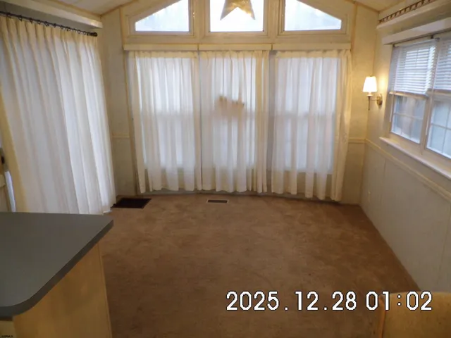 a kitchen with stainless steel appliances granite countertop a stove and a refrigerator