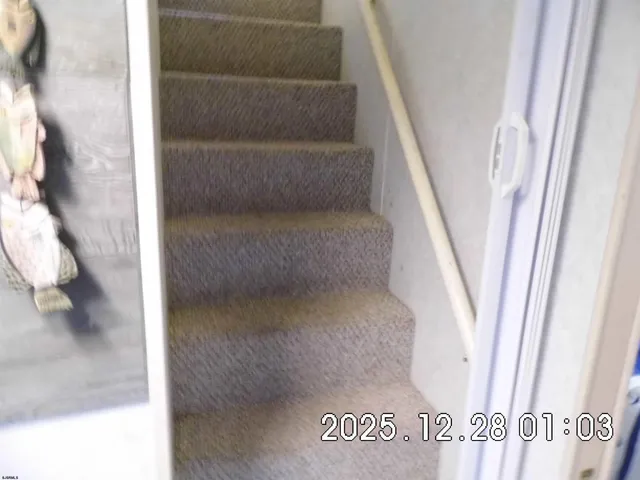 a view of hallway with stairs