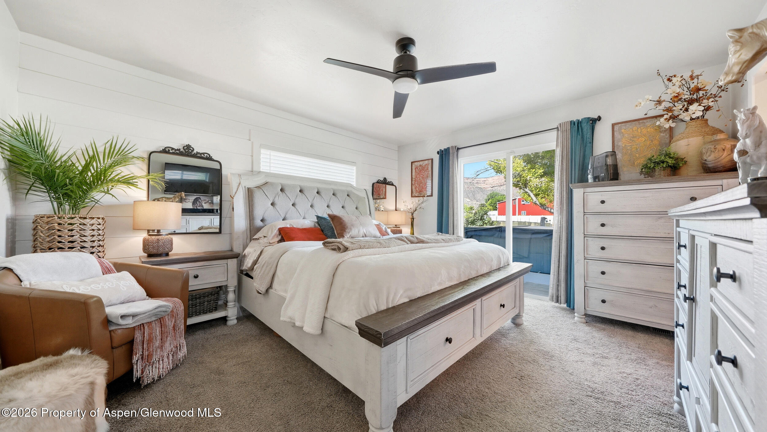 445 South Camp Road Grand Junction, CO 81507 - Photo 18 of 37 a bed room with a bed and a ceiling fan