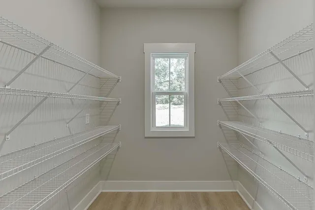 a view of an empty walk in closet