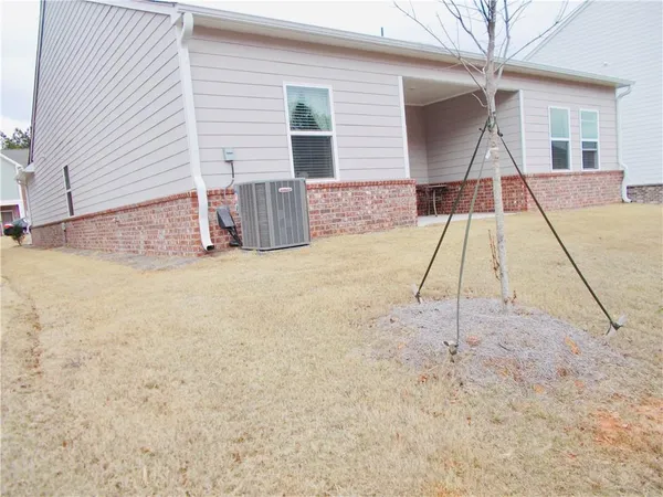 a view of backyard of a house