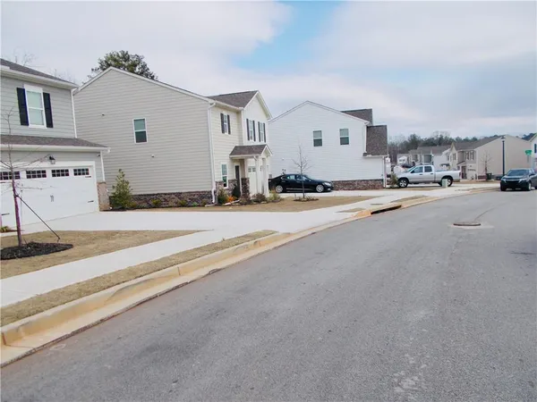 a view of house with garage