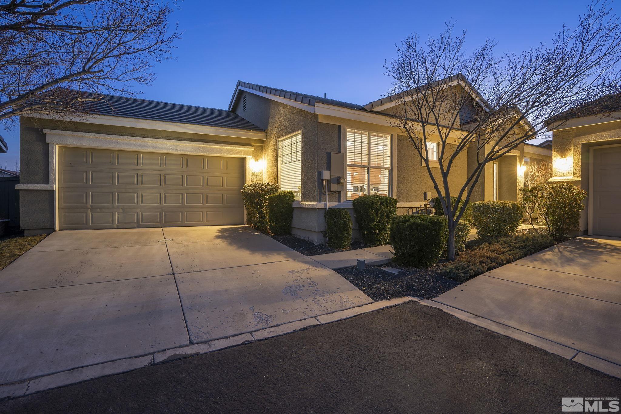 10417 Chadwell Drive Reno, NV 89521 - Photo 1 of 40 a view of a house with backyard and porch