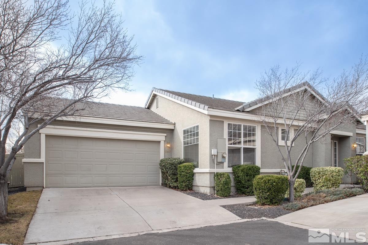 10417 Chadwell Drive Reno, NV 89521 - Photo 23 of 40 front view of a house with a yard