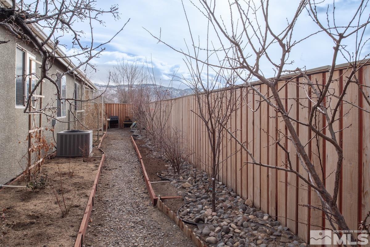 10417 Chadwell Drive Reno, NV 89521 - Photo 30 of 40 a backyard of a house with lots of green space