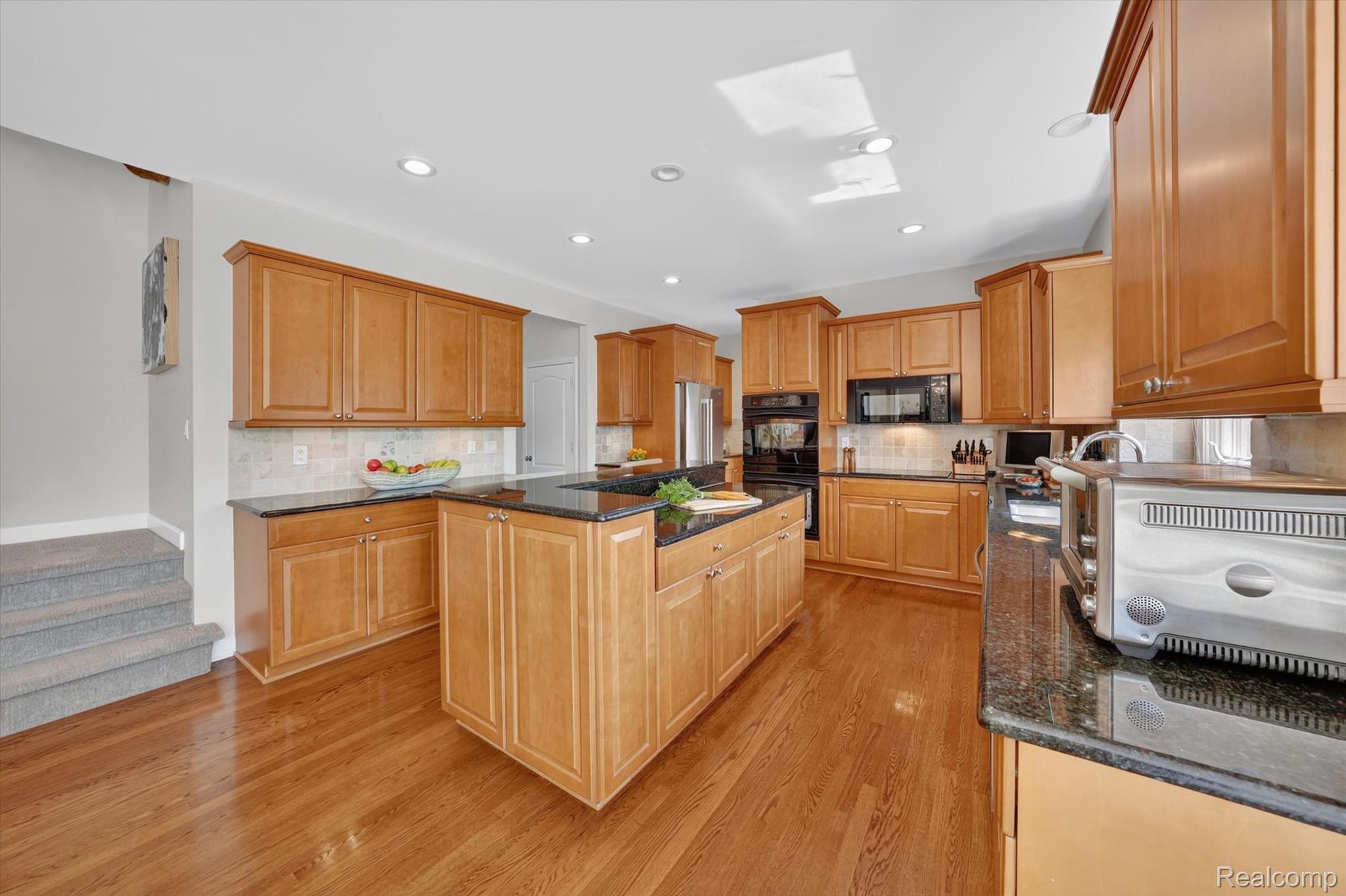3804 Elk Drive Rochester, MI 48306 - Photo 12 of 75 Kitchen features refinished hardwood flooring