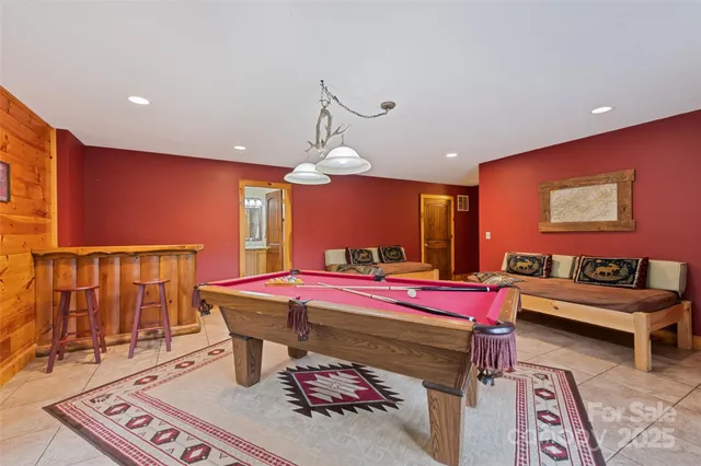 a view of living room with furniture and wooden floor