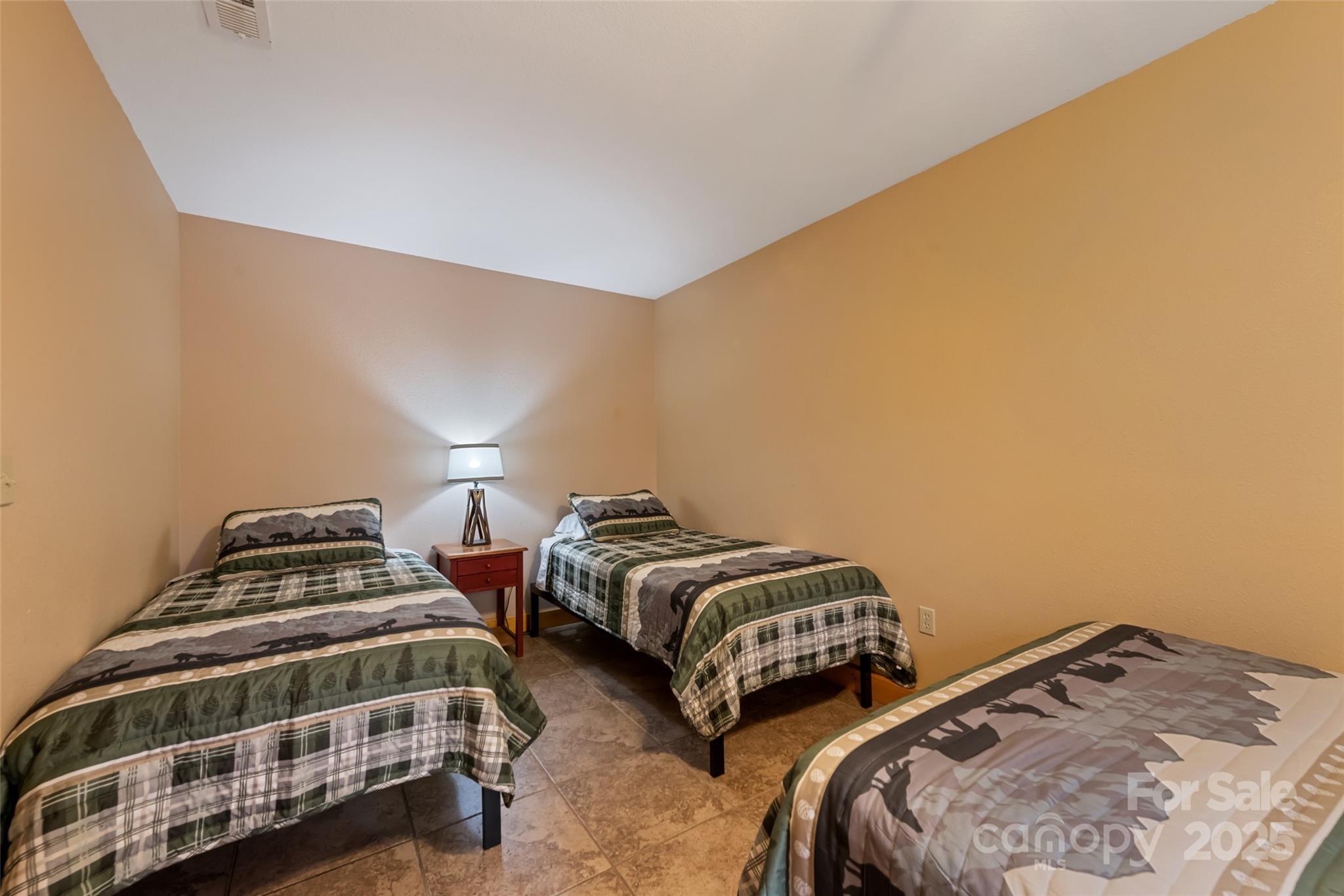 235 Soaring Eagle Road Bryson City, NC 28713 - Photo 37 of 43 a bedroom with two beds and a closet