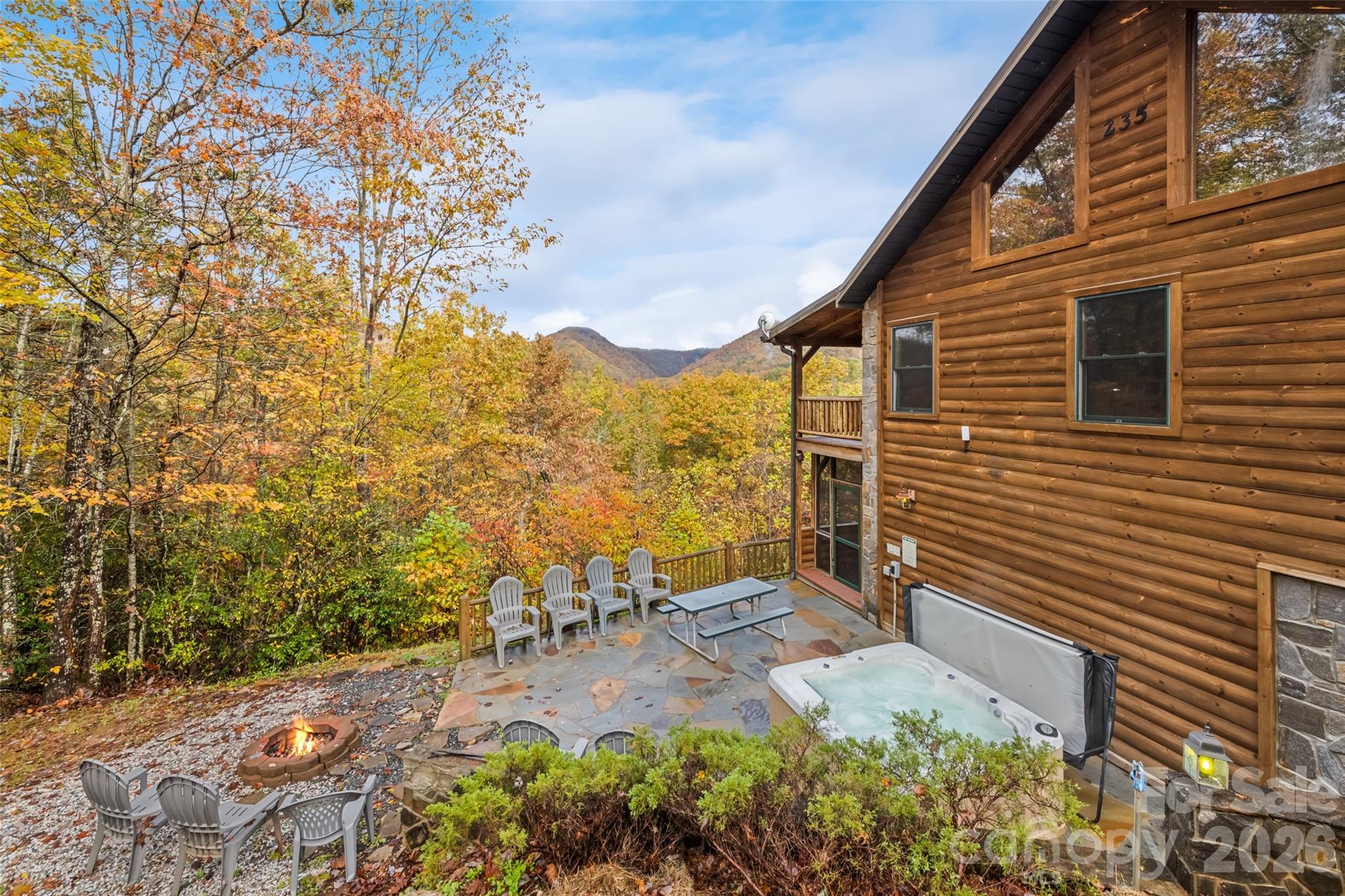 235 Soaring Eagle Road Bryson City, NC 28713 - Photo 42 of 43 a backyard of a house with lots of green space