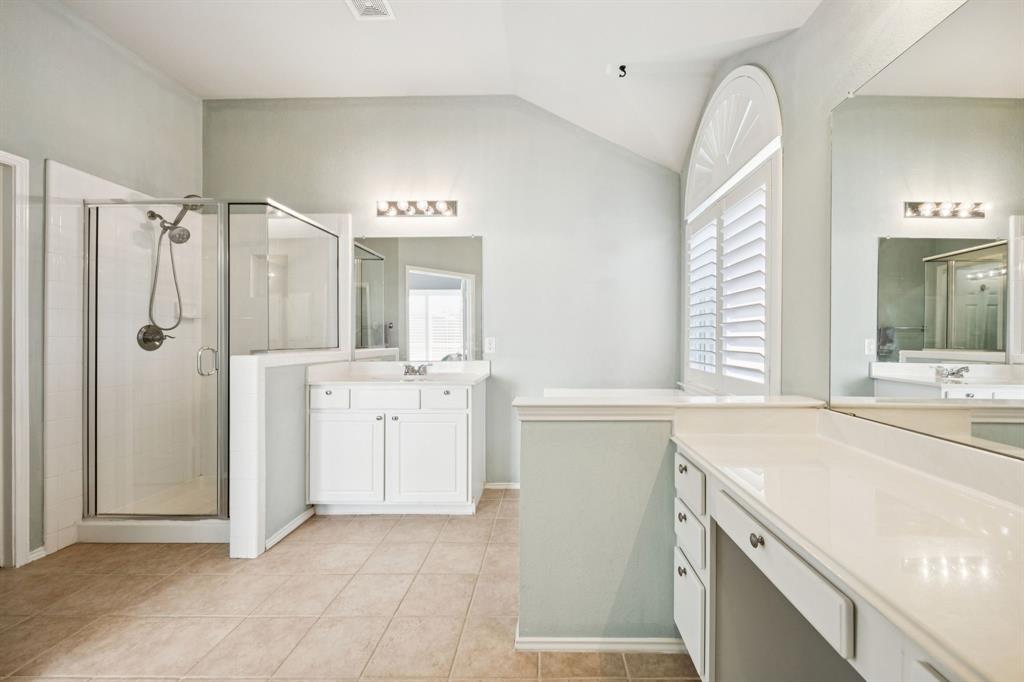 3012 Mason Avenue Corinth, TX 76210 - Photo 22 of 28 a view of a kitchen with a sink and dishwasher with white cabinets