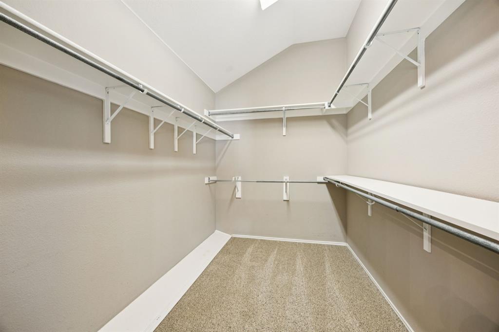 3012 Mason Avenue Corinth, TX 76210 - Photo 23 of 28 a view of a room with racks on the wall