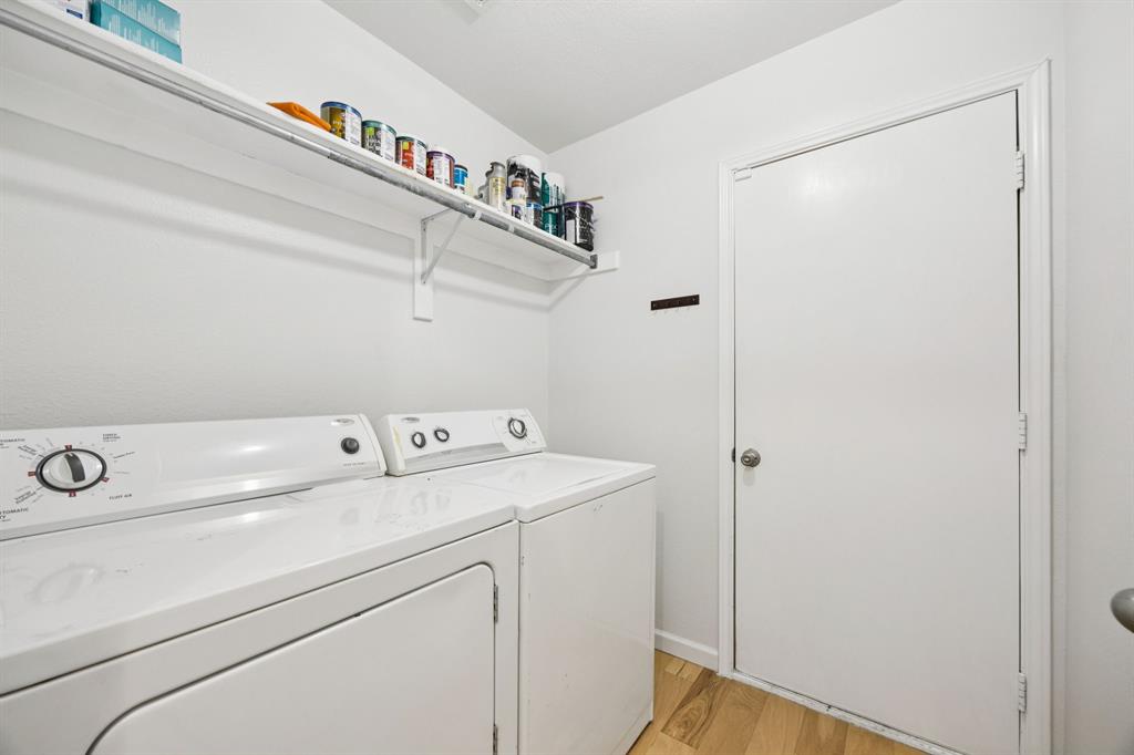 3012 Mason Avenue Corinth, TX 76210 - Photo 24 of 28 a utility room with dryer and washer