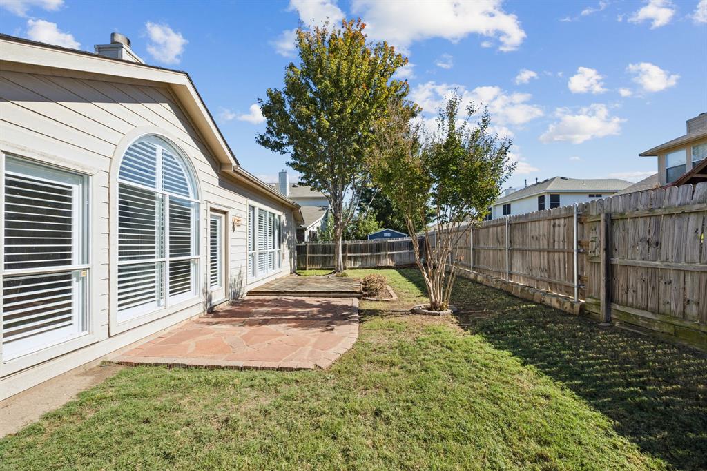 3012 Mason Avenue Corinth, TX 76210 - Photo 25 of 28 a view of a house with backyard and sitting area